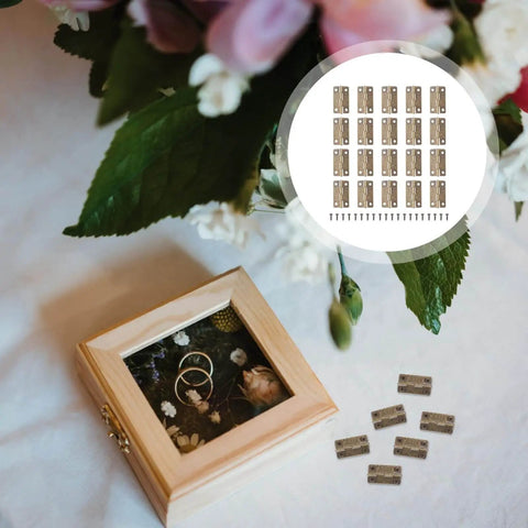 1.2 Inch Miniature Iron Chest Hinges With Screws 50 Pack For Small Cabinets Jewelry Boxes DIY Crafts Antique Copper Finish with open box.