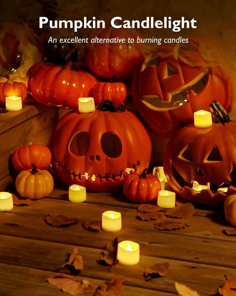 Flickering LED Tea Lights 24Pcs Battery Operated For Votive Centerpieces around Halloween pumpkins