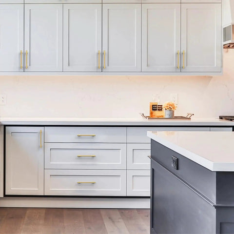Modern kitchen with 10 Pack Champagne Bronze Cabinet Pulls 5 Inch Center To Center Heavy Duty Solid Kitchen Drawer Handles installed on white cabinets.