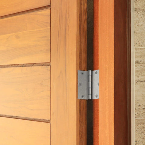 Interior door hinge, 3.5x3.5 inches, satin nickel finish, heavy-duty steel, installed on wooden door.
