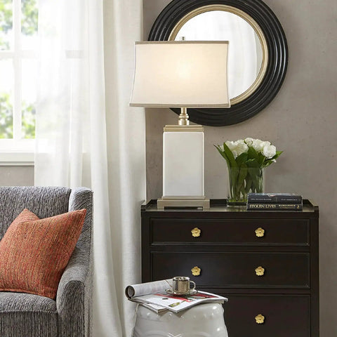 Modern living room with dresser featuring Gold Flower Dresser Knob Set 4 Pack Brass Floral Cabinet Knobs for dresser drawers, lamp, and decor.