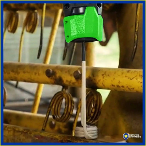 Venom HP Mini Ductor Induction Heater For Rusted Fasteners And Bearings With 3 Coils shown in use on metal machinery