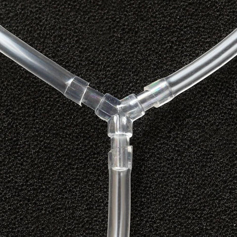 Clear plastic Y-shaped aquarium airline tubing connector with three barbed ends for 3/16 inch hoses.