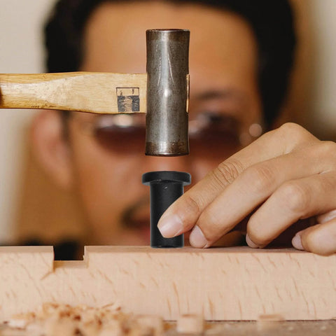 Person using a hammer with a 4 Pack Heavy Duty Sliding Barn Door Track Spacers Kit With Adjustable Carbon Steel Connectors And Bolts