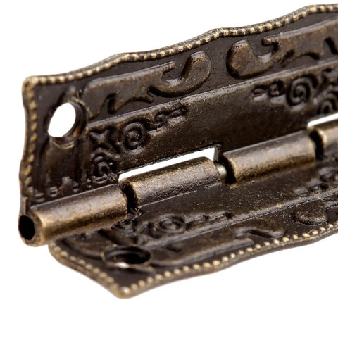 Close-up of Antique Bronze Small Hinges Set 2 Pcs Engraved Decorative Hinges for Wooden Boxes, Jewelry Boxes, Dollhouses, 1.42x0.91 inches.