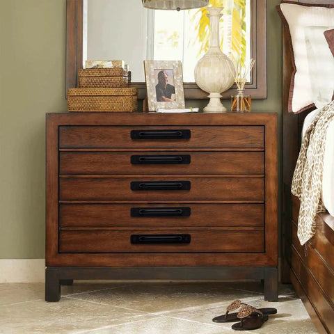 Wooden dresser with 12 Pack Matte Black Cabinet Handles And Drawer Pulls Aluminum 5 Inch Hole Center installed on drawers.