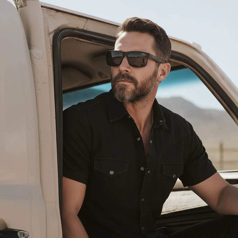 Man wearing Polarized Sunglasses For Men And Women Do It All With UV Protection Lightweight Relialite Frame Full Square Sporty Design.