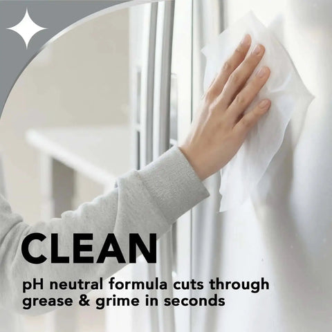 Hand using wipes from Stainless Steel Cleaner And Polish Kit Three Piece With Spray Wipes And Cloth Anti Fingerprint Formula.
