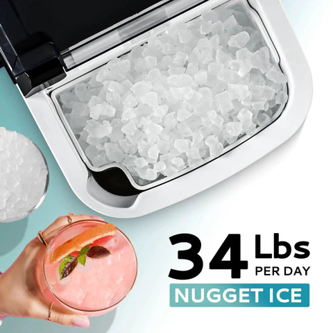 Top view of Nugget Ice Maker Countertop With Auto Clean, 34 Lbs Per Day, showing ice compartment filled with ice, and a drink on the side.