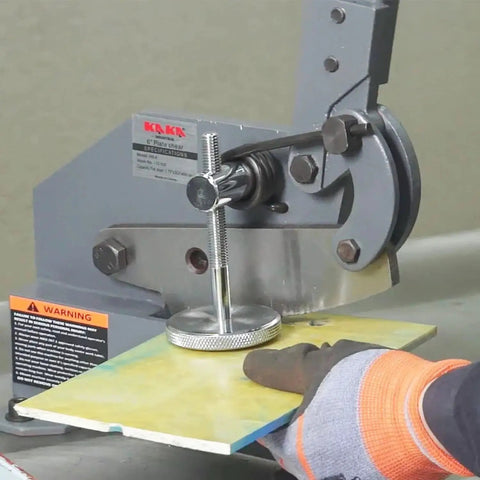 No Fuss Effortless 5 Inch Metal Shear With Long Lever Handle cutting metal sheet, used in auto repair and fabrication.