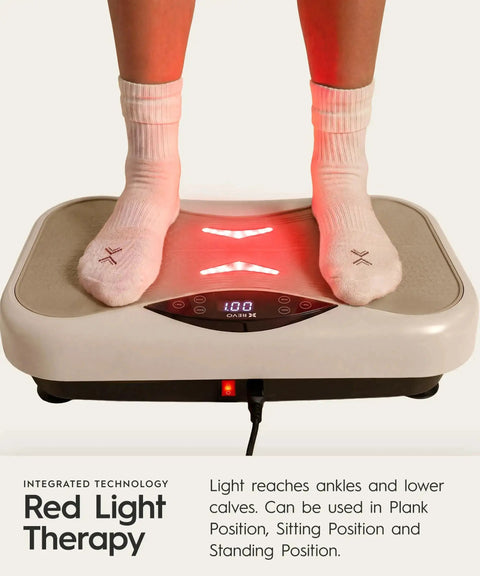 Wave Board With Red Light Therapy And Vibration Plate For Lymphatic Drainage in use, showing red light and digital display.