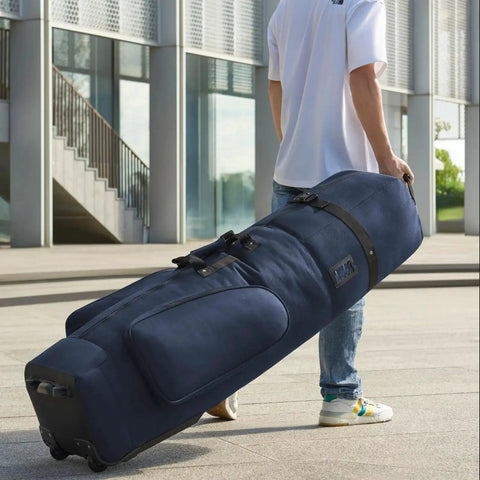 Person carrying Built Tough Padded Golf Travel Bag With Wheels For Airlines Durable 1680D Wear Resistant Oxford And Waterproof Coating