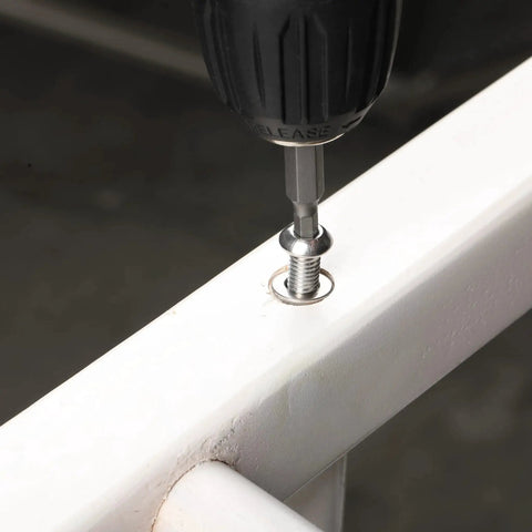 Drill inserting stainless steel screw into white surface from Stainless Steel Fastener Kit With 810 Pieces Nuts Bolts And Washers For DIY Projects M3 M4 M5 M6 Button Head Socket Cap Screws Assorted Hex Bolts Nuts And Washers For Home Auto And Outdoor Use Built To Last Durable Rust Resistant Hardware Set