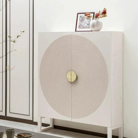 White cabinet with concentric circle design and gold pull, featuring Two Pack Half Moon Cabinet Pulls Chinese Style Handle Antique Zinc Alloy Gold Finish.