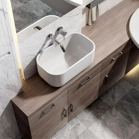 Bathroom vanity with 30 Pack 5 Inch Square Matte Black Cabinet Handles For Cabinets Drawers And Dressers, installed on wooden drawers under a white sink.
