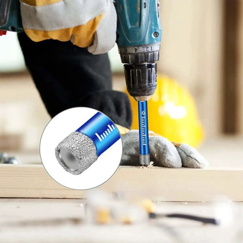 Close-up of a drill using the 9 Piece Dry Diamond Drill Bits Set Pro Grade For Glass Ceramic Tile Granite Quartz Stone 6mm To 12mm Core Drill Kit Dry Drilling Bits For Precise Crack Free Holes And Fast Cutting In Porcelain And Marble on wood
