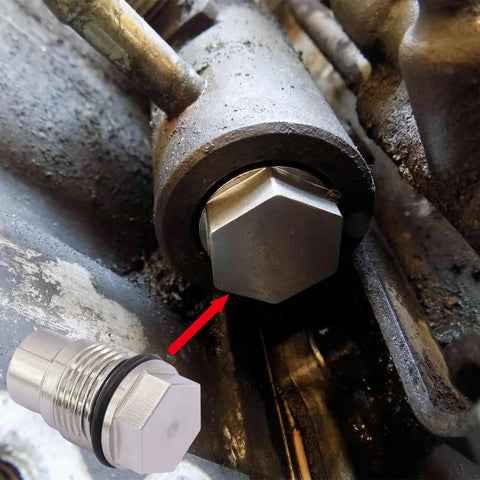 Fuel rail plug valve, stainless steel, M20x1.5; hex head installed in a diesel engine with loose matching plug and O-ring nearby.