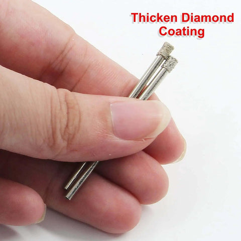 Close-up of hand holding diamond-coated drill bits from Diamond Hole Saw Set For Glass Tile Marble Ceramic Granite Quartz Gemstone With Twelve Pieces One Eighth Inch Shank Five Millimeter Cutting Depth Diamond Drill Bits By Luomorgo No Fuss Easy Cut Crack Free Drilling And Long Lasting Performance.