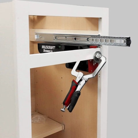Ultimate Cabinet Jig Bundle For DIYers with Drawer Slide Jig installed in a wooden cabinet frame