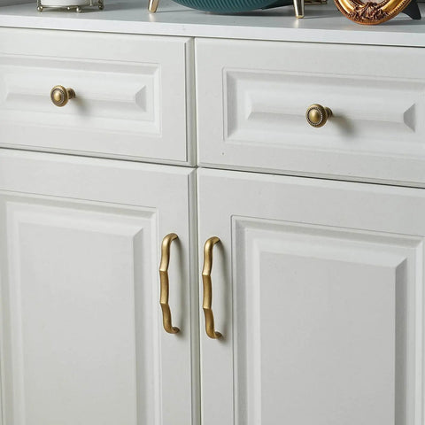 Solid Brass Cabinet Pulls 5 Pack, 5 Inch Hole Center Drawer Handles installed on white cabinets