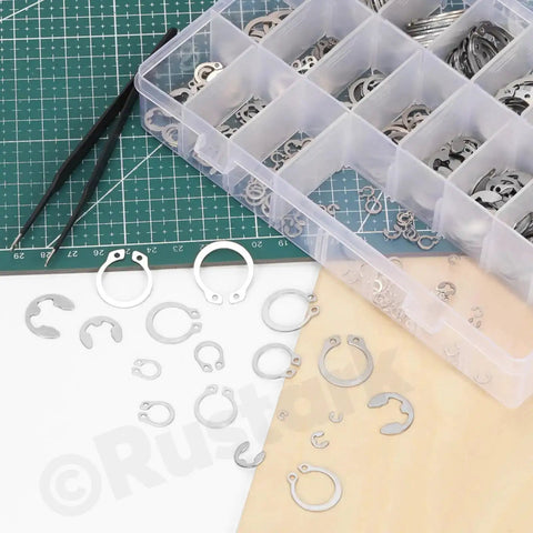 304 Stainless Steel E Clip And C Clip Retaining Rings Kit With Tweezers, 303 Pcs Assortment, 21 Sizes From M1.5 To M28 displayed on table