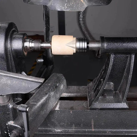 Built Tough 2MT Live Tailstock Center for woodturning in action on lathe, showing heavy-duty MT2 center with 60-degree point and bearing.