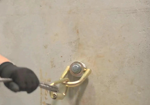 10K Swivel Anchor Five Eighths Inch By Six Inches Expansion Anchor With Full Size D Ring In Zinc Plated Stainless Steel installed on concrete wall