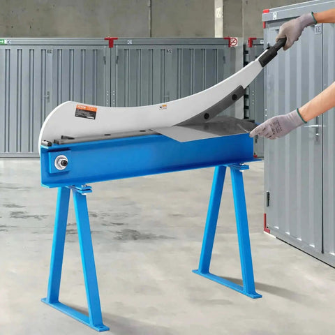 Beefy Hand Plate Shear 31.5 Inch Max Cutting Length Manual Sheet Metal Cutter with T10 high hardness blades shown in a workshop setting