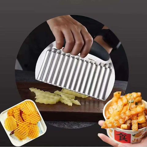 Close-up of Two Pack Crinkle Fry Cutter Set for Potatoes and Veggies in use with ergonomic non slip handles, cutting crinkle fries.
