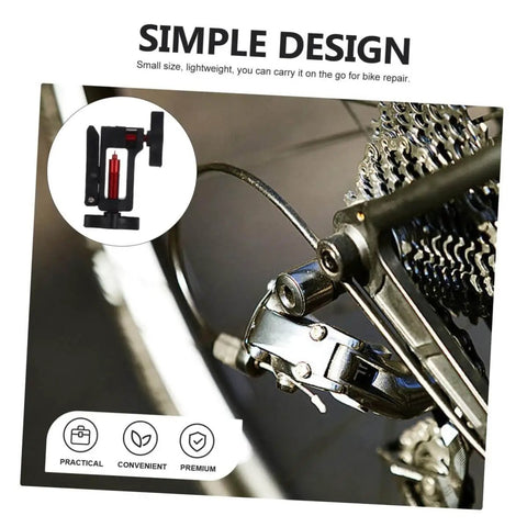 Close-up of Hydraulic Hose Fitting Insert Tool For Bicycles With Needle Driver and bike drivetrain for clean installation.