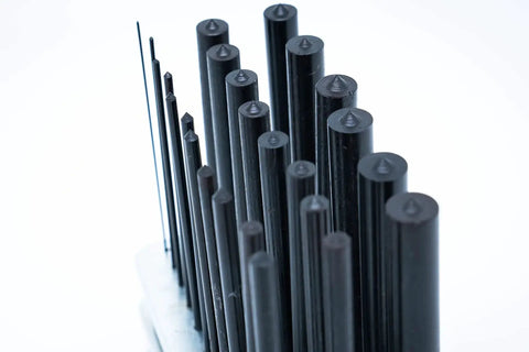 Heavy Duty 25 Piece Transfer Punch Set from 1mm to 13mm by 0.5mm increments, tool steel with black oxide finish, close-up view.