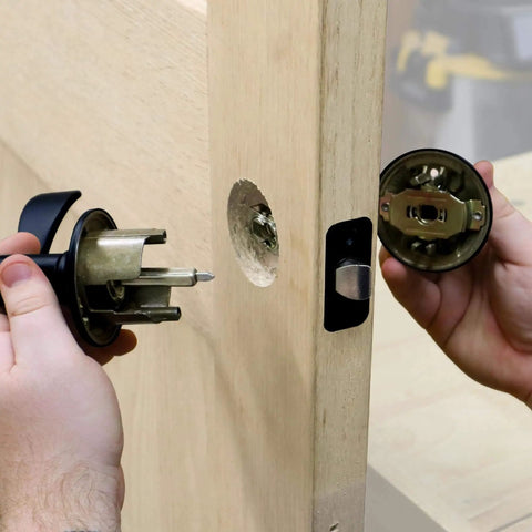 Self Clamping Door Lock Jig Kit For Installing Locks Handles And Hinges With Bi Metal Hole Saws Includes Mortise Router Bits And Cutting Tools DIY Friendly Cutting Tools Included Adjustable Backsets For Common Door Installations No Screws Needed And No, installation process on wooden door.