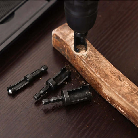 Durable 8 Piece Wood Plug Cutter Drill Bit Set with One Quarter Inch Hex Shank, shown in use on a wood surface, Bromirix.