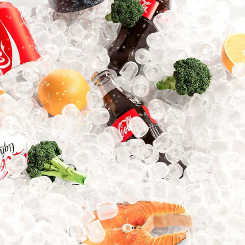 Assorted vegetables and bottled beverages on ice, illustrating the cooling capability of appliances like a Countertop Ice Maker With Handle 26 Lb 24H Portable 9 Bullet Ice Cubes.