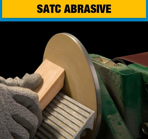 Close-up of 6 inch 80 grit adhesive backed sanding discs aluminum oxide for drill used on wooden block