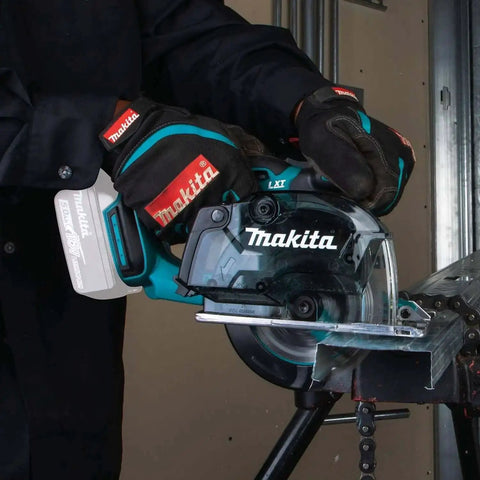 Person using 18V LXT Cordless Metal Cutting Saw Bare Tool With 5 3 8 Inch Cut Capacity, Up To 2 Inch Cutting Depth, 3,600 RPM on metal pipe