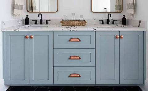 Antique Copper Cabinet Knobs 5 Pack One And A Quarter Inch Zinc Single Hole Center Pulls For Kitchen Cabinets And Drawers Vintage Retro Hardware Classic Rustic Cabinet Knobs For Home Renovation installed on blue cabinets