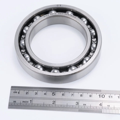 XiKe 6013-C3 open deep groove ball bearing, 65x100x18 mm, front view with visible steel balls