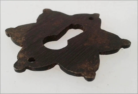 Side view of Star Shape Keyhole Cover Escutcheons 1.5 X 1.5 Inch Forged Brass 2 Pack, ideal for furniture restoration projects.