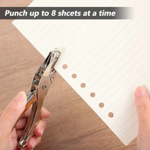 Dope 20 Pack One Quarter Inch Single Hole Punch Set punching lined paper, image showing metal hand paper puncher with five sheet capacity.