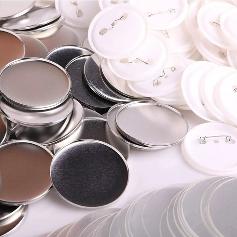2.25-inch blank metal button badges with metal shells, white plastic backs, and clear Mylar sheets