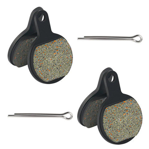 Two black Tektro IOX.11 disc brake pads with speckled friction material and mounting pins