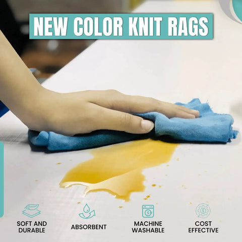Hand cleaning oil spill with Color Knit Cleaning Rags 25 lb Box Multipurpose Cotton T Shirt Rags for all-purpose use