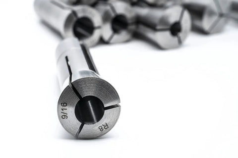 Close-up of Round Collet Set For Milling Machines 11 Pcs R8 Range 1/8 To 3/4 Inch With 7/16-20 Internal Thread, metal tooling.