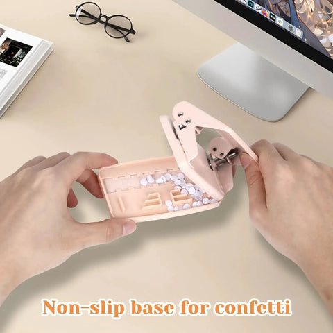 Person using Pink Two Hole Punch With Ruler One Quarter Inch Punch For File Folders And Looseleaf Metal Manual Low Force Double Punch