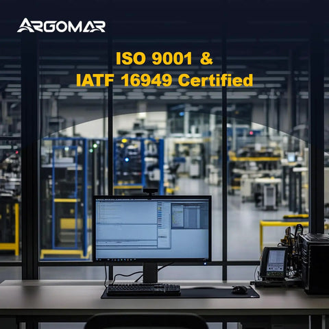 Argomar certification display with computer workstation, highlighting ISO 9001 and IATF 16949 compliance in industrial setting