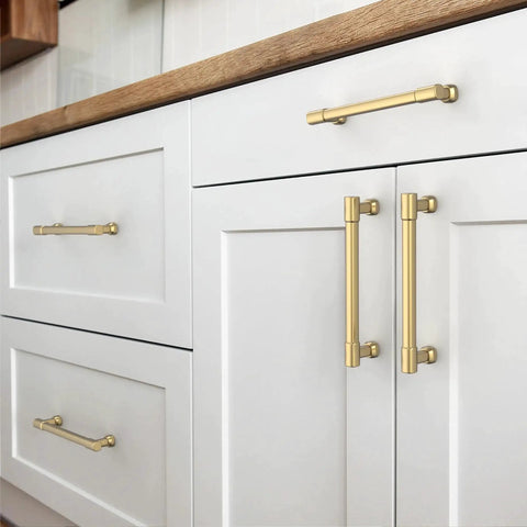 Champagne Bronze Cabinet Pulls 5 Inch Hole Centers Zinc Alloy Square Handles installed on white kitchen cabinets