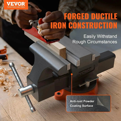 6.5 Inch Jaw Vise With 360 Degree Swivel Locking Base on workbench, ductile iron construction, showing replaceable carbon steel jaw plates.