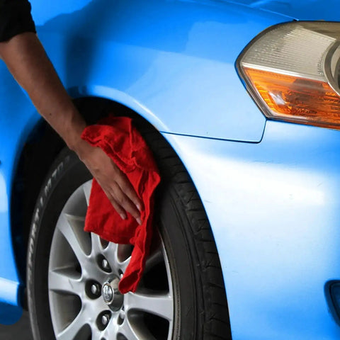 Using Premium Cotton Shop Towels 14x12 Inches 90-Count Reusable Cleaning Rags For Auto, Garage, Home And Industry Absorbent Grease Oil Spill Cleanup With Premium Recycled Fibers Red on car wheel.