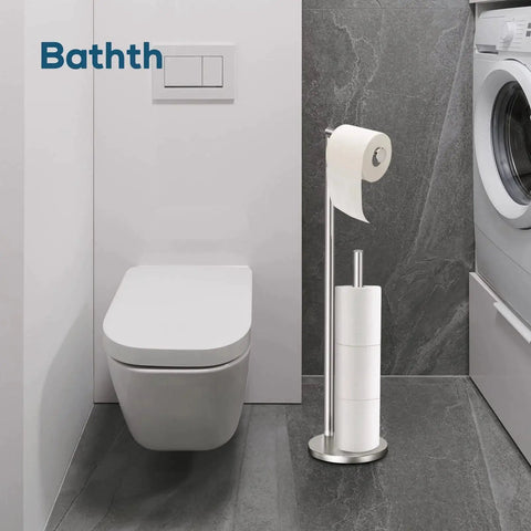 Brushed Nickel Free Standing Toilet Paper Holder Stand with space for one in use roll and three spare rolls in a modern bathroom.